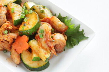 Korean food, cucumber and chicken stir fried with kimchi
