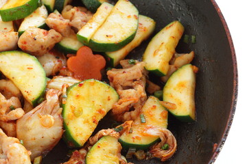 Korean food, cucumber and chicken stir fried with kimchi
