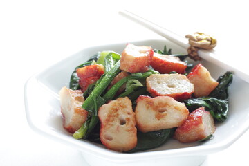 Chinese food, fish cake and green leaf vegetable Spinach stir fried
