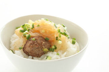 Chinese food, meat ball and glass noodles simmered with Chinese cabbage on rice
