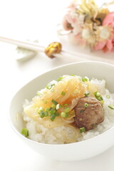 Chinese food, meat ball and glass noodles simmered with Chinese cabbage on rice
