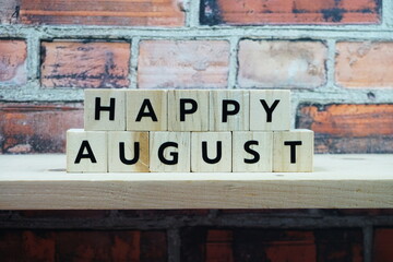Happy August alphabet letter on shelves wooden background