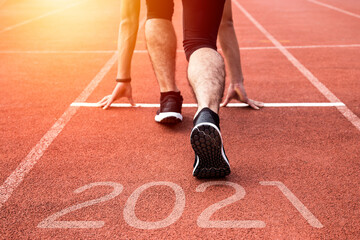 New year or start straight concept. Close Up on shoe of athlete runner running to success and new...