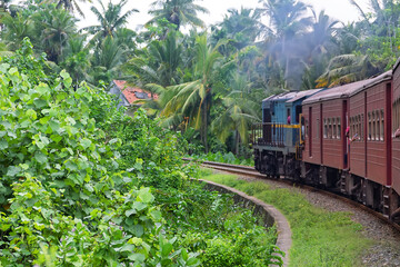 Train arrives at platform with passengers in Srilanka