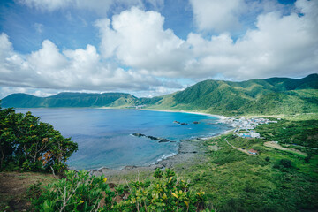 Fototapeta na wymiar Landscape view from Nipple Hill on Lanyu island in Taitung. Landscape view with sea and mountains on a sunny day.