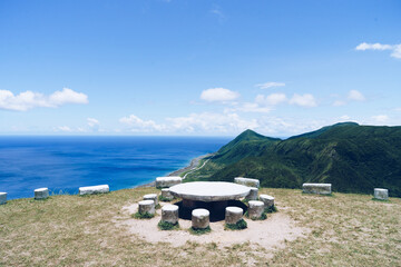 The beautiful top point view with blue sky, ocean and mountain at Orchid Island( Lanyu) Weather Station.