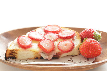 Homemade strawberry and cheese sugar toast for healthy gourmet breakfast