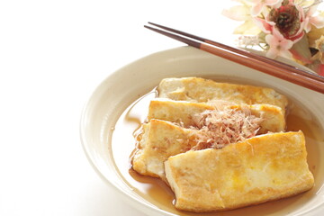 Japanese food, pan fried tofu and soy sauce with Katsuobushi