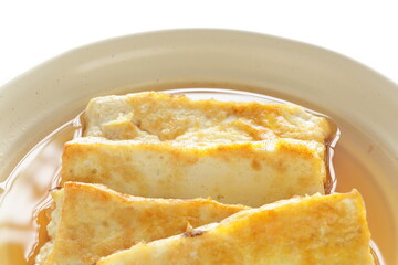 Japanese food, pan fried tofu and soy sauce with copy space