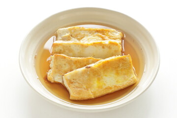 Japanese food, pan fried tofu and soy sauce with copy space