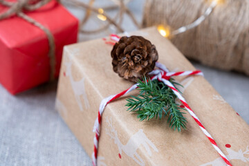 Fototapeta na wymiar New Year's gifts in craft packaging