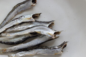 Japanese food ingredient,  dried small sardines on bamboo basket for broth cooking