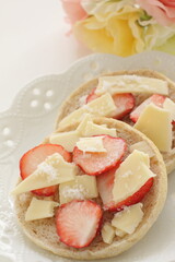 homemade sugar and cheese with strawberry in English muffin sandwich
