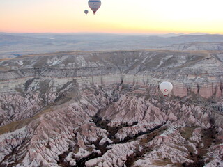 Panorama of the picturesque snow-white sharp-topped volcanic rocks of Cappadocia from the height of...
