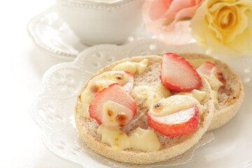 cheese and sugar with strawberry in English muffin sandwich 