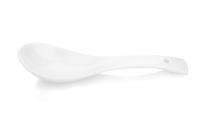 White empty ceramic spoon for soup on white background