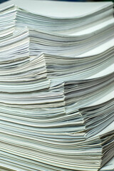 bundles bales of paper documents. stacks packs pile on the desk in the office