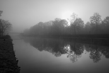 Fototapeta premium gloomy river in the fog. High quality photo