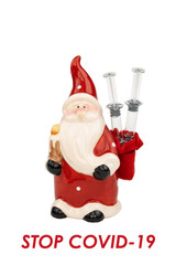 Santa with syringes and STOP COVID-19 text.