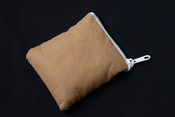 small grey colored pouch