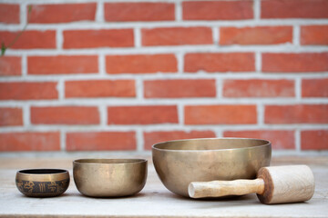 Ancient hand crafted traditional Tibetan meditation and healing singing bowls made from 7 sacred metals which are typical accessories used in buddhism, yoga and meditation
