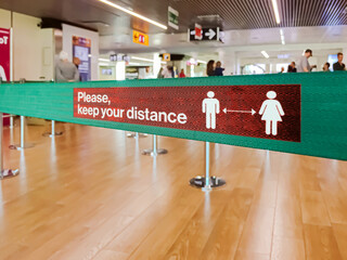 Warning of social distancing in airport
