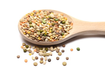 Mixed legumes and cereals, peeled barley, green, yellow and dark red lentils, half green peas, black white beans, green beans with wooden spoon isolated on white background