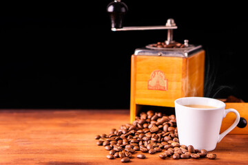 Fresh cafe for morning breakfast refresh caffeine white cup roasted organic coffee bean farm in vintage wood grinder classic metal coffee pot for black espresso and cream milk cappuccino latte