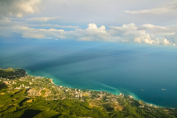 Fototapeta premium Coastline. Port city on the seashore, seascape. Bay, harbor in the bay. Beautiful sea or ocean with islands. Vacation by the sea