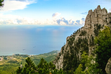 Fototapeta premium Coastline. Port city on the seashore, seascape. Bay, harbor in the bay. Beautiful sea or ocean with islands. Vacation by the sea