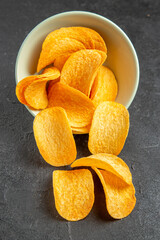 top view cheese cips inside plate on dark background cinema photo movie potato snack