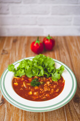 Pork macaroni in a plate on the table