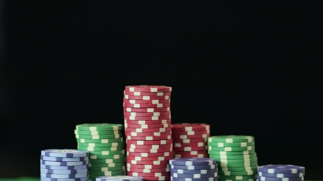 Poker chips on a dark background