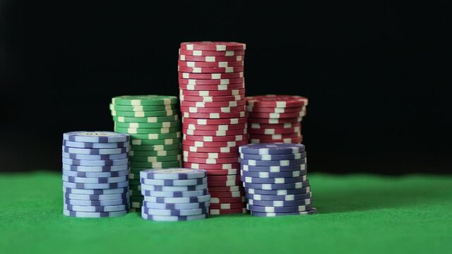 Poker chips on a dark background