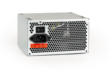 Fototapeta premium New power supply unit with On Off switch, power cord socket and voltage sticker isolated on white background. Personal computer PSU replacement, hardware equipment concept.