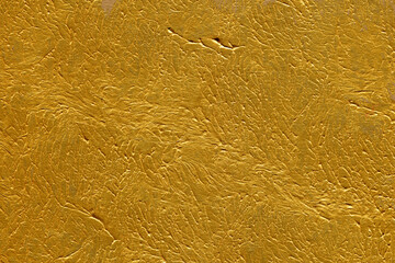 Modern contemporary acrylic background. Gold paint texture made with a brush. Luxury abstract...