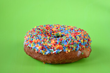 Donut in a multicolored confectionery dressing