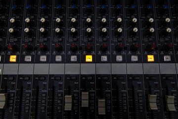 Closeup of professional audio digital mixing sound console