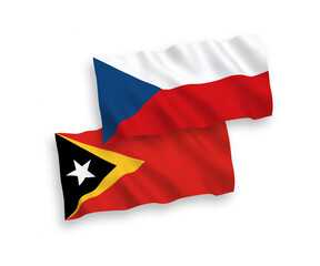 National vector fabric wave flags of Czech Republic and East Timor isolated on white background. 1 to 2 proportion.