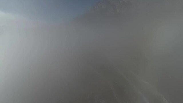 Caucasus, Ossetia. Alagir gorge. Clouds over the valley near the Rocky Range.