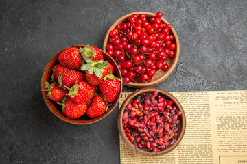 top view fresh red cranberries with other fruits on dark background berry fruit color xmas holiday