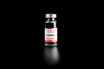 COVID-19 vaccine isolated on black background. Healthcare And Medical concept.