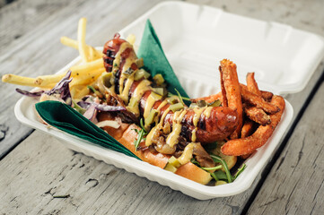 Hot dog, french fries and sweet potato fries