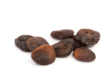 Naturally dried apricots isolated on white background.