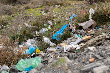 Trash thrown away in nature, environmental problems. Nature disaster concept