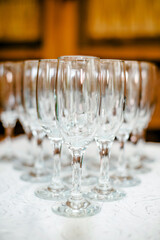 Wine glasses are on the table in the restaurant
