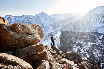 Beautiful landscape of mountains and man with Santa cap