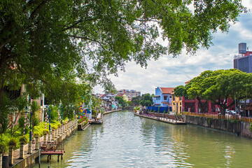 Riverside scenery of a cruise crossing by the Melaka River, Malacca, Malaysia