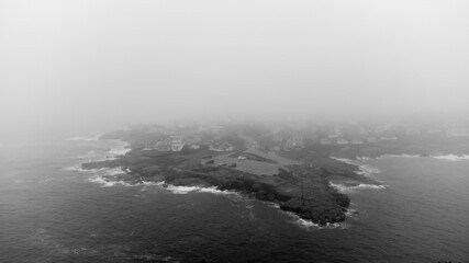 Aerial drone photo of York Maine USA black and white foggy weather