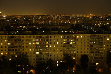 Light in the houses of the sleeping area at night. Moscow, Russia.